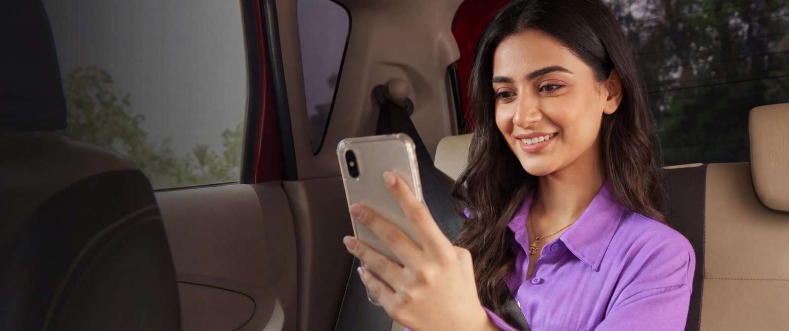 A university student exploring available rides on her phone